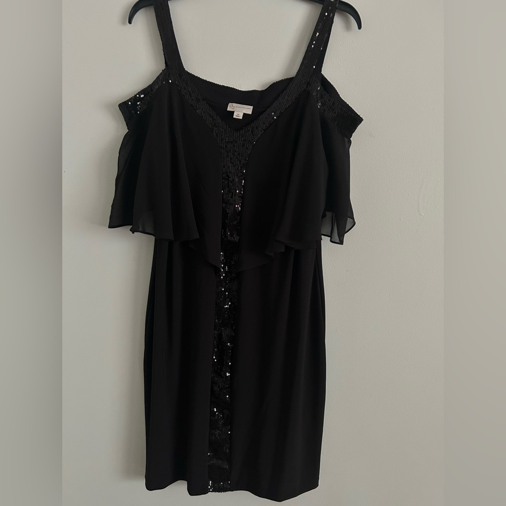 Cocktail dress. Off shoulder sleeve. Never used.